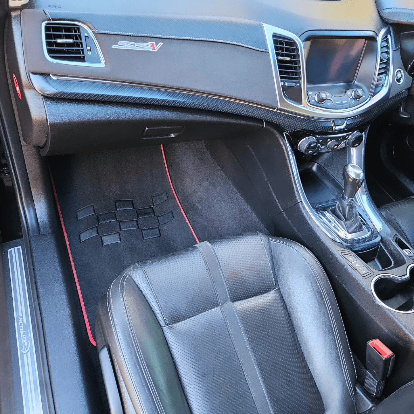 Shampooed floor mats and detailed dashboard in a Holden SSV