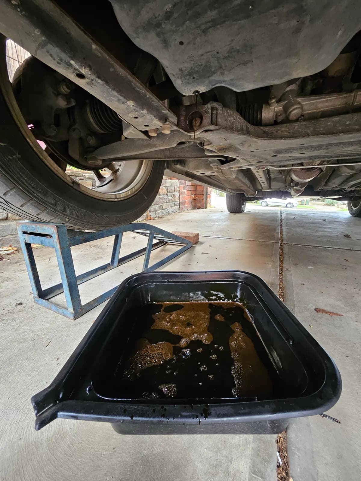 Vehicle raised on stands for an oil and filter change