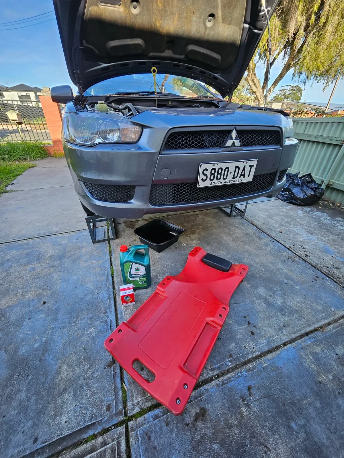 Brake and suspension check on a lifted wheel